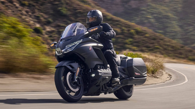 2025 Honda Gold Wing cruising through a hilly road