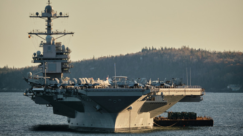 USS Gerald R. Ford at sea during dusk