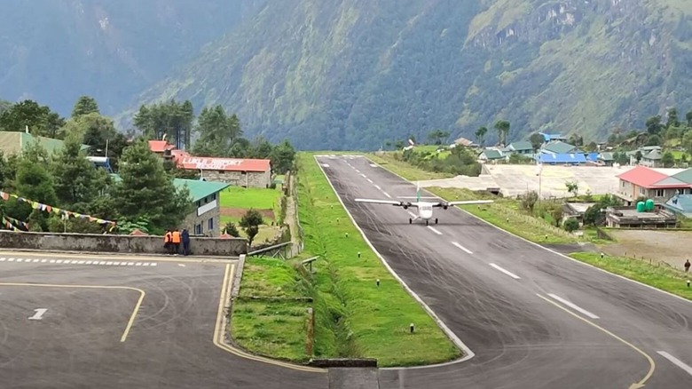 Small aircraft landing at Tenzing-HIllary airport in Nepal