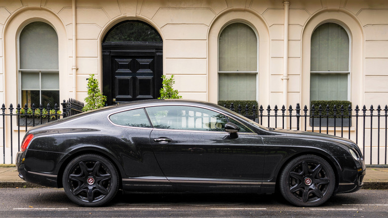 Side shot of a black Bentley Continental GT
