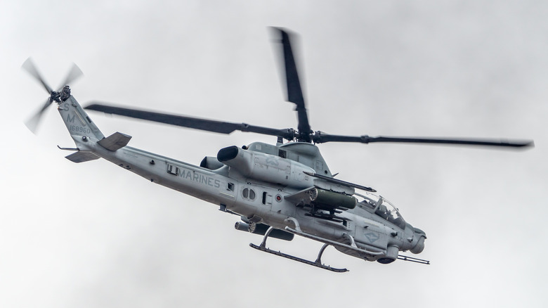 Attack Helicopter AH-1Z Viper flying in a bad weather