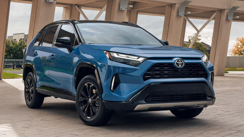 Blue 2025 Toyota RAV4 parked