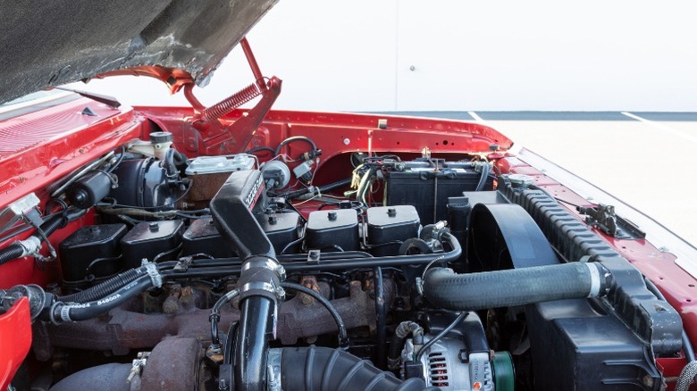 A clean engine bay of an older first generation Dodge Cummins pickup truck