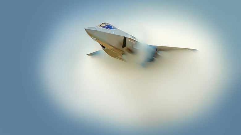 A jet forming a cloud as it goes supersonic