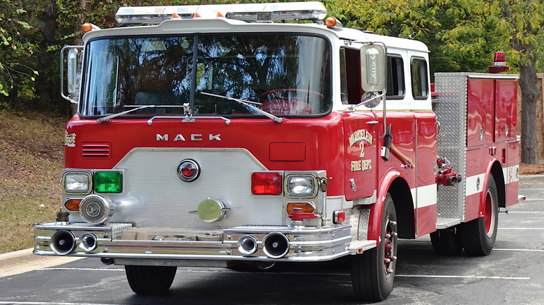 Red vintage Mack Firetruck parked