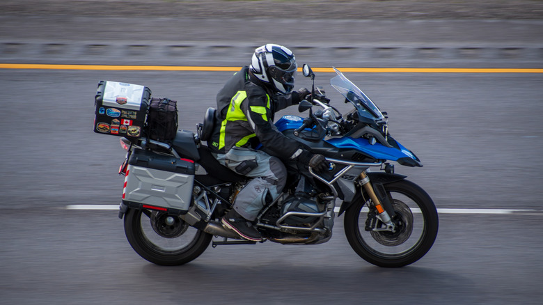 A motorcyclist riding a BMW bike