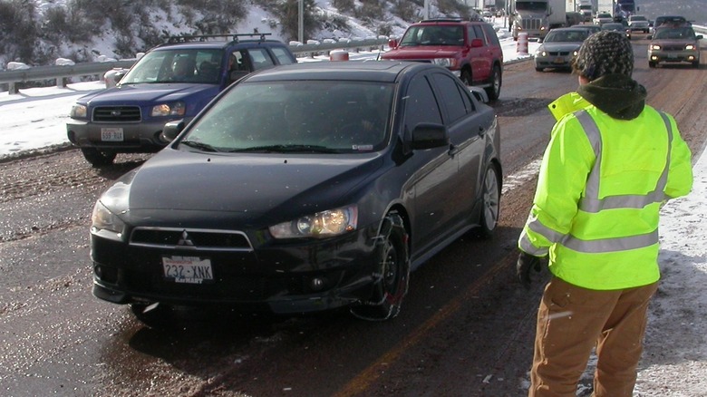 Tire chains on winter roads with snow