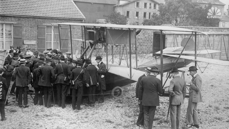 Onlookers surround the Curtiss C-2 in which 21-year-old Lawrence Sperry demonstrated his Sperry gyroscopic stabilizer to win the Concours de la Securité en Aéroplane on June 18, 1914.