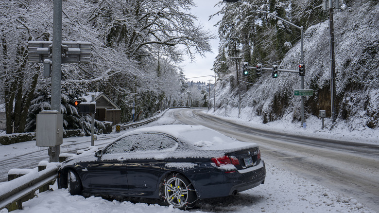 A car crashed on a snowy road