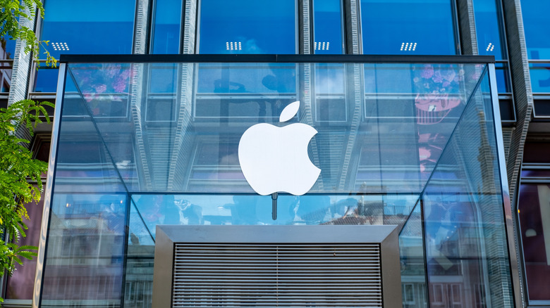 Apple logo on a glass building