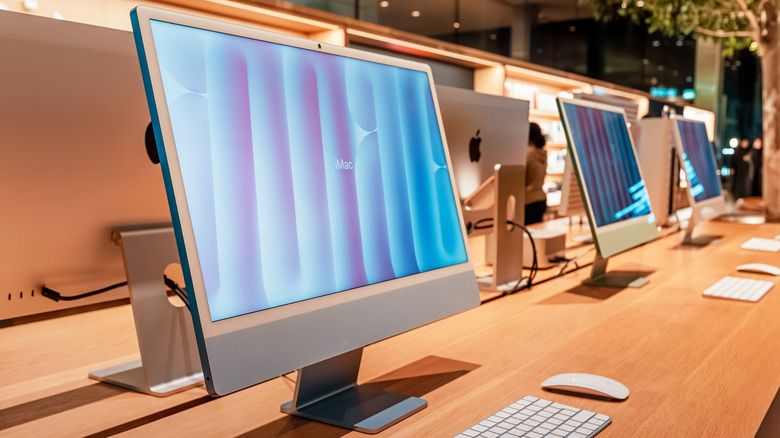 iMacs on a display row