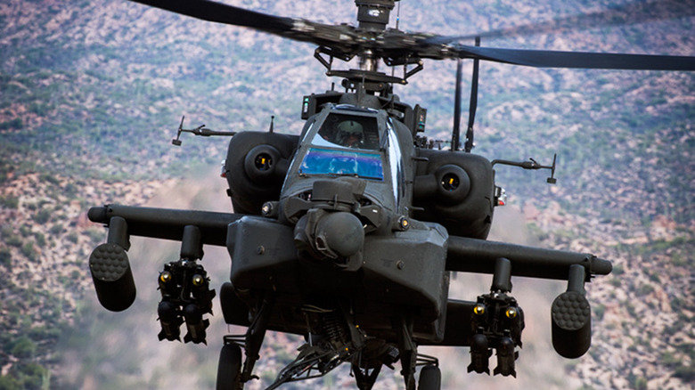 Head on view of Apache attack helicopter in flight