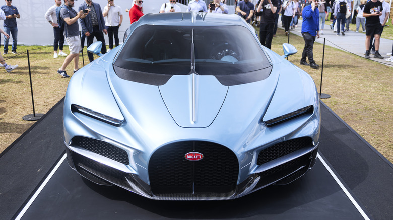 Blue Bugatti Tourbillon parked front end
