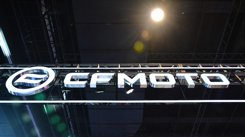 A CFMOTO sign at a motorcycle show