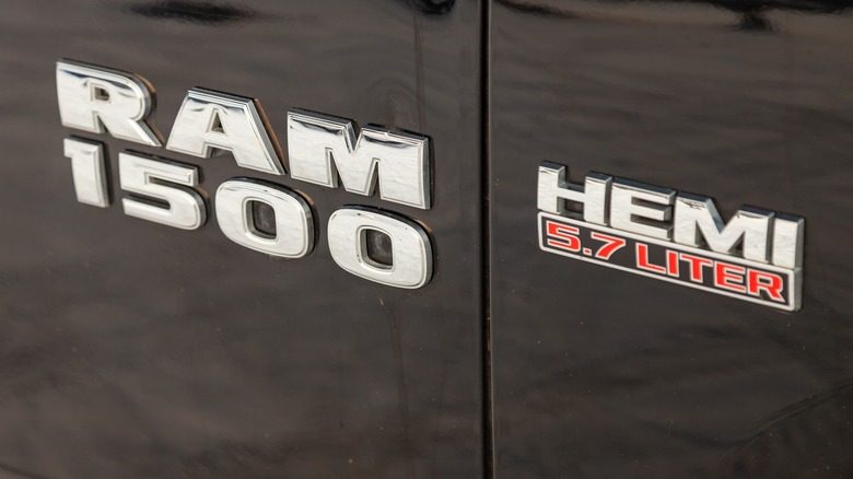 Ram 1500 and 5.7-liter HEMI badges on a dark background