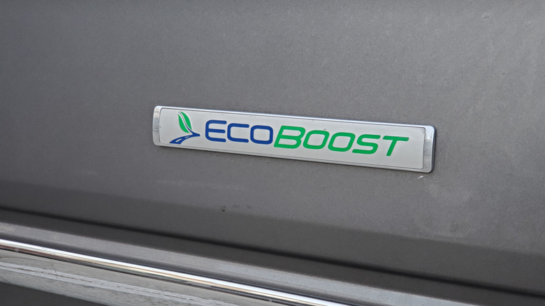 Close-up shot of the EcoBoost logo on a Ford vehicle