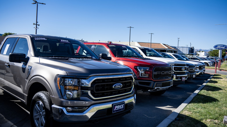 A selection of different vehicles from the Ford Motor Company on sale at a dealership in Valencia California