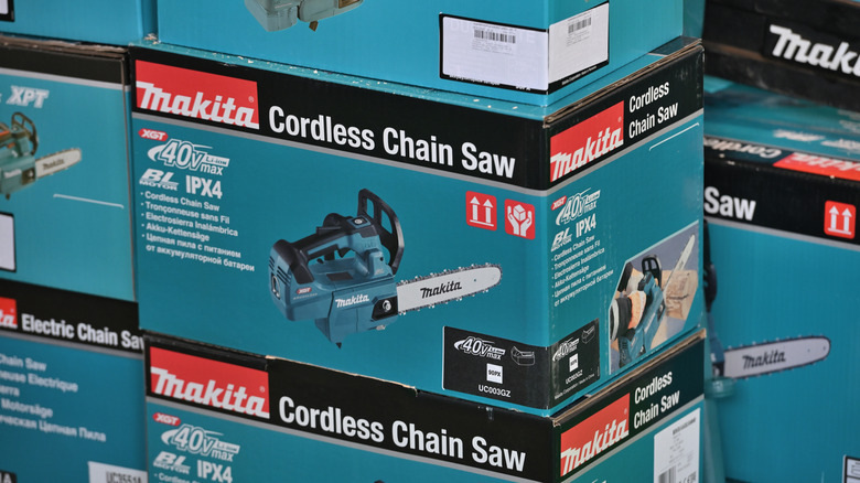Stacks of Makita chain saws on sale