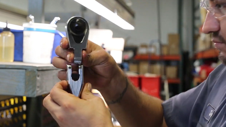 Worker assembles a Matco ratchet