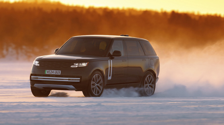 Range Rover electric prototype driving in snow