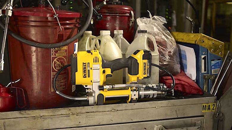DeWalt Greas Gun resting on a shelf