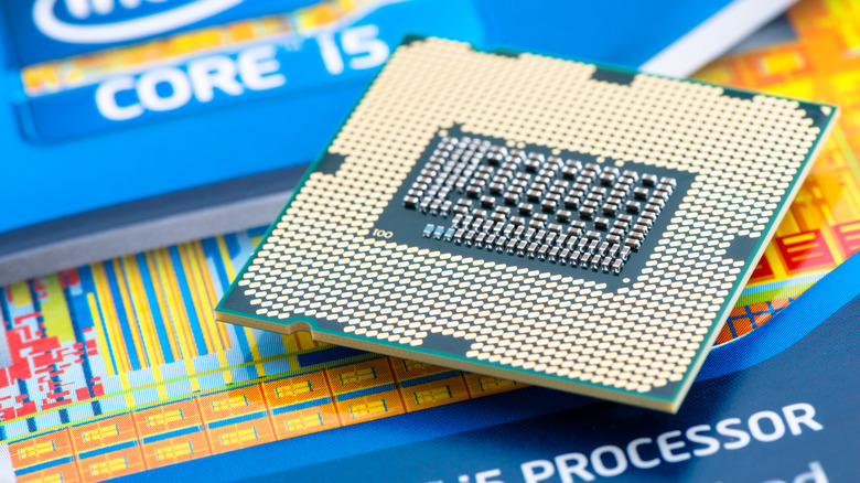 Closeu-up of an Intel processor with Intel branding in the background