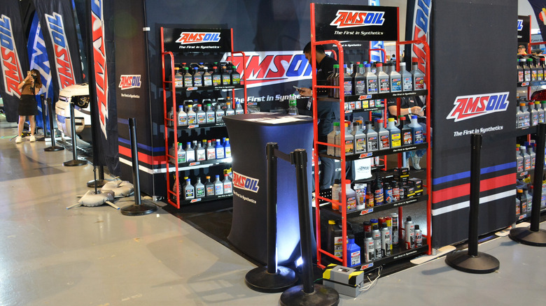 A booth at a convention showcasing Amsoil oil products