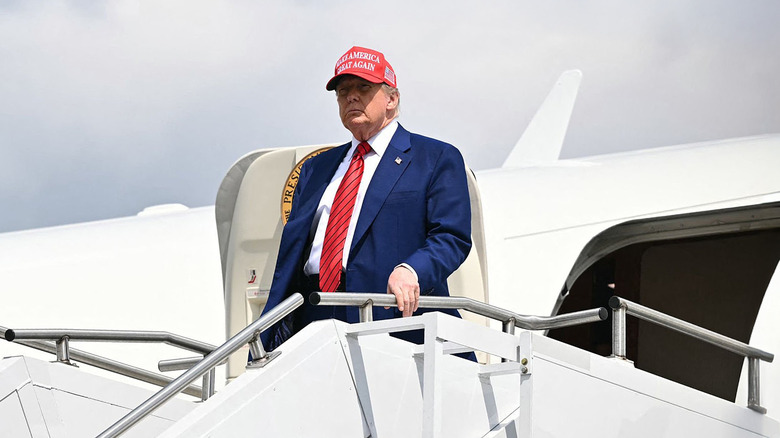 Donald Trump standing atop Air Force One