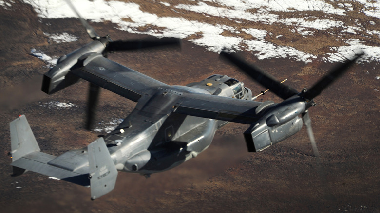 V-22 Osprey in flight with the tilt rotors acting a propellers