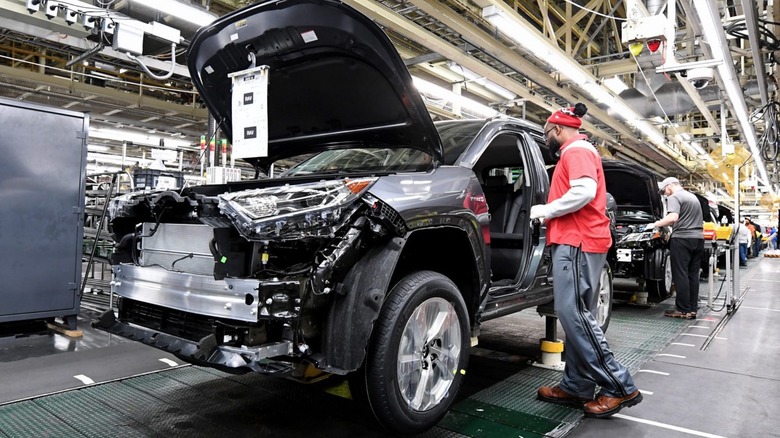 Person assembling Toyota SUV