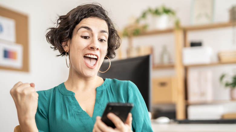 woman holding a smartphone