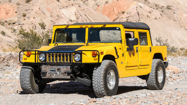 Yellow Hummer H1 in the desert