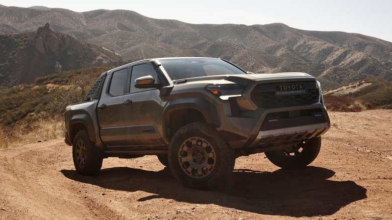 Toyota Tacoma Trailhunter parked off road on a mountain