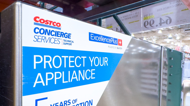 costco extended warranty sticker on an appliance inside a store