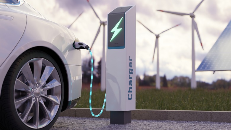 Electric car plugged in charging