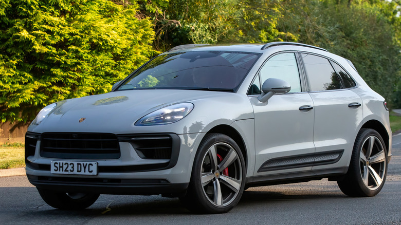 A silver Porsche Macan parked