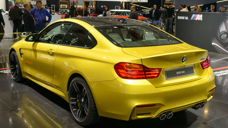 Yellow BMW M4 on display