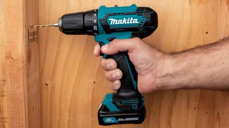 Makita 12V max CXT Cordless ⅜-inch Driver‑Drill in use