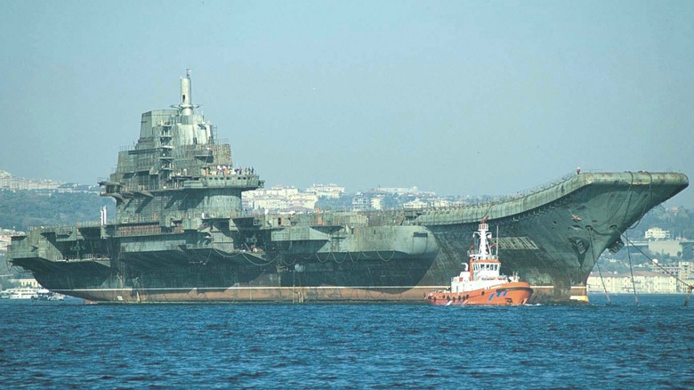 Ex-Varyag aircraft carrier under tow in Istanbul in 2001 for conversion for the People's liberation Army Navy