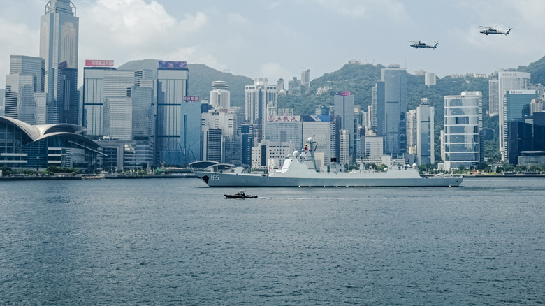 The Chinese People's Liberation Army Navy missile destroyer Zhanjiang sails through Victoria Harbor
