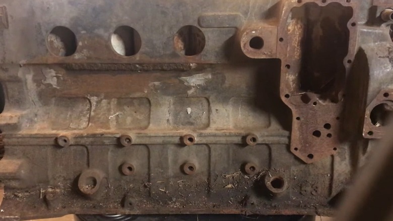 A welded repair on a cracked Cummins 53 engine block.