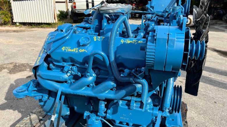 A Fuel Pincher engine, finished in blue and displayed on blocks outside