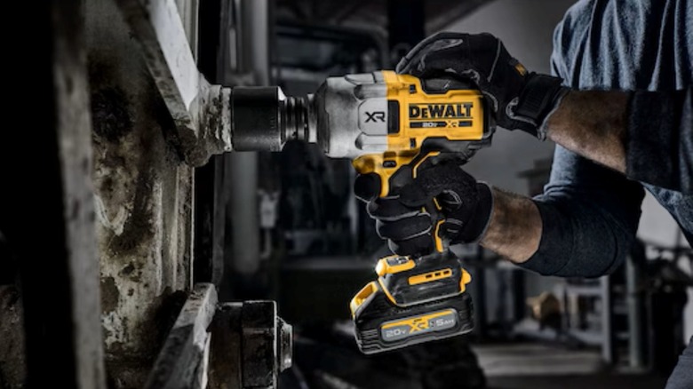 Attacking a very large nut with DeWalt's High Torque 3/4-inch drive DCF964 impact wrench.