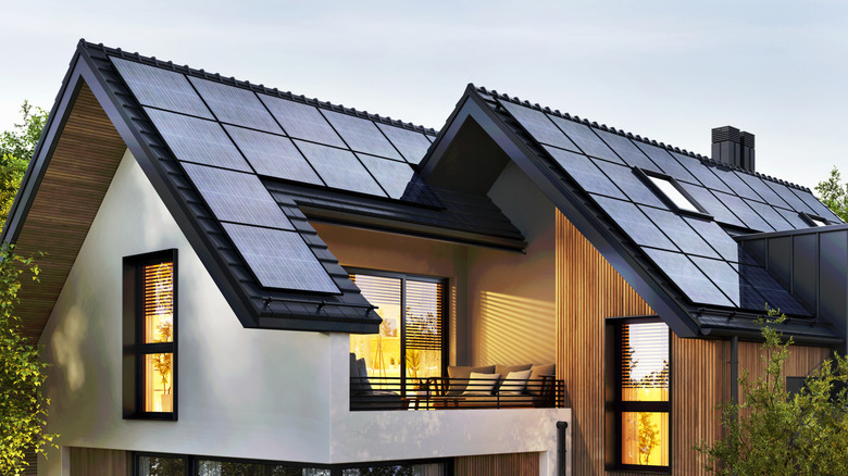 Solar panels on the roof of a modern house