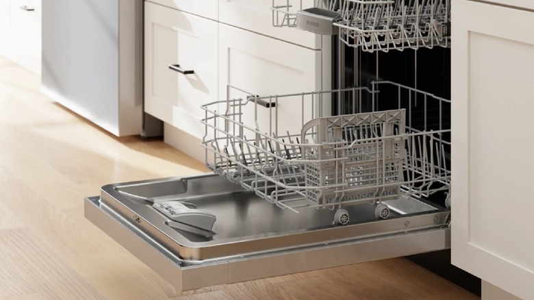 A close-up of an open Bosch 300 Series dishwasher.