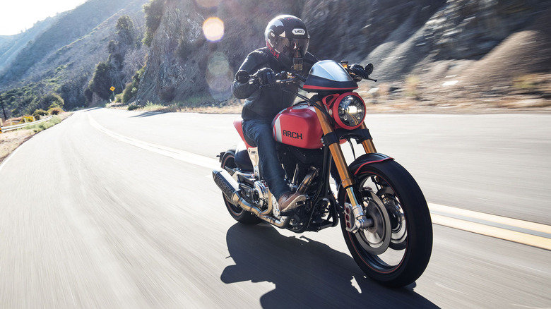 Man riding an Arch motorcycle on a mountain road