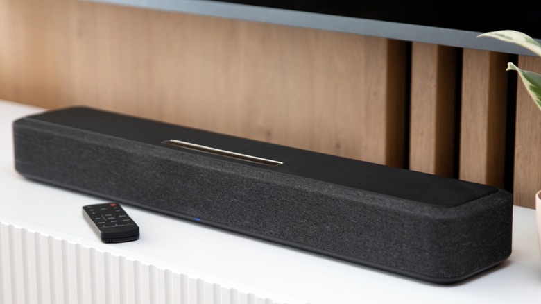 Black sound bar on a console setup