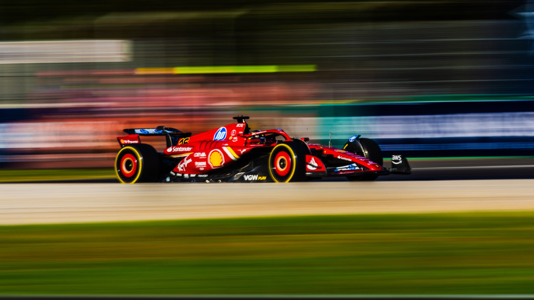 A Ferrari formula one car racing at Monza