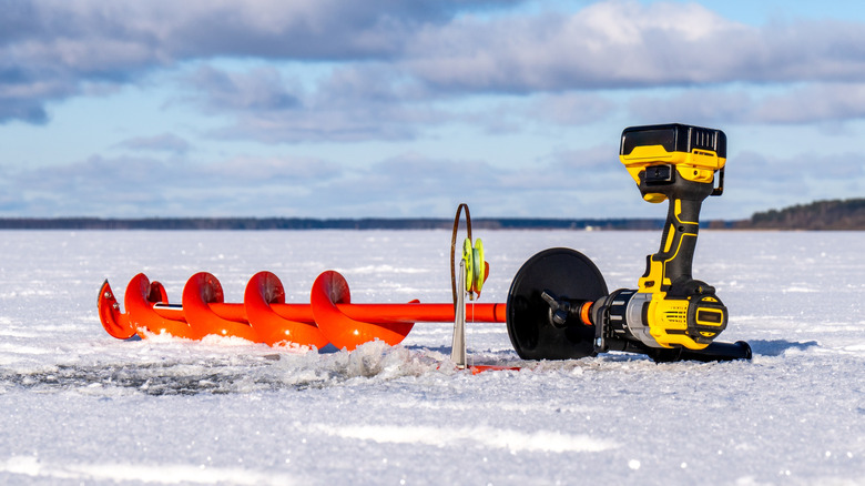 DeWalt drill powered ice auger on ice