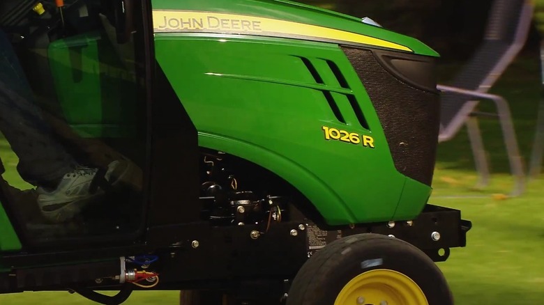 Close-up side view of the John Deere 1026R.